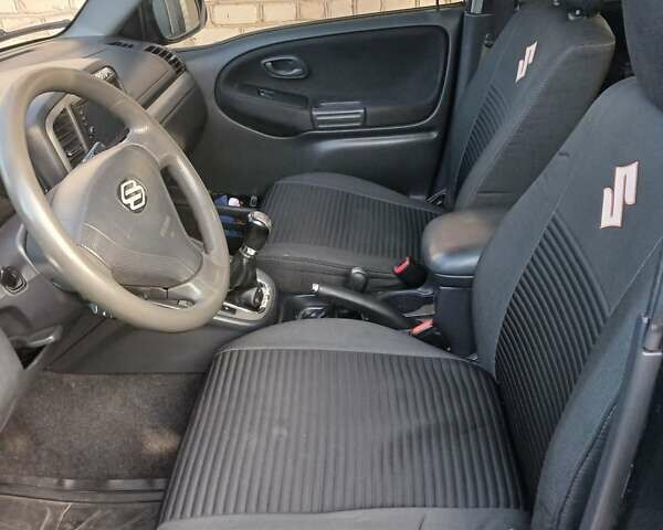 Чорний Сузукі Гранд Вітара, об'ємом двигуна 2 л та пробігом 227 тис. км за 5600 $, фото 7 на Automoto.ua