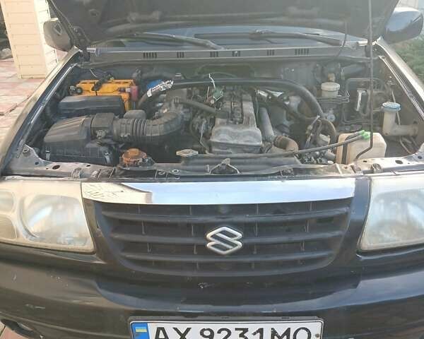 Чорний Сузукі Гранд Вітара, об'ємом двигуна 2 л та пробігом 227 тис. км за 5600 $, фото 12 на Automoto.ua