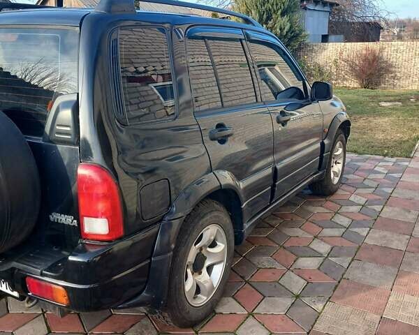 Чорний Сузукі Гранд Вітара, об'ємом двигуна 2 л та пробігом 227 тис. км за 5600 $, фото 4 на Automoto.ua