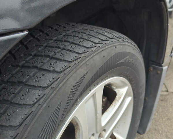 Чорний Сузукі Гранд Вітара, об'ємом двигуна 2 л та пробігом 240 тис. км за 5999 $, фото 11 на Automoto.ua