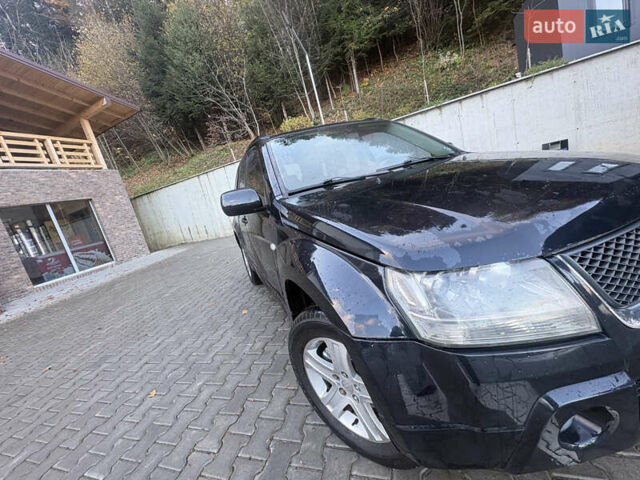 Чорний Сузукі Гранд Вітара, об'ємом двигуна 2 л та пробігом 293 тис. км за 5498 $, фото 10 на Automoto.ua