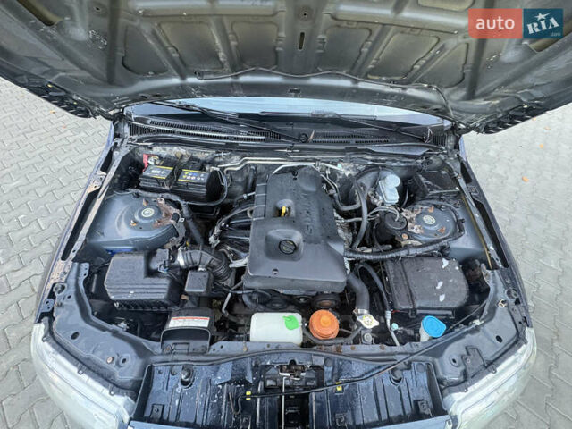 Чорний Сузукі Гранд Вітара, об'ємом двигуна 2 л та пробігом 293 тис. км за 5498 $, фото 12 на Automoto.ua