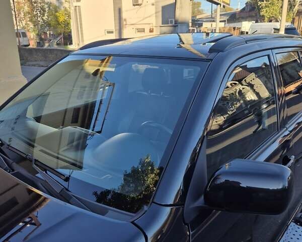 Чорний Сузукі Гранд Вітара, об'ємом двигуна 2 л та пробігом 109 тис. км за 9600 $, фото 4 на Automoto.ua