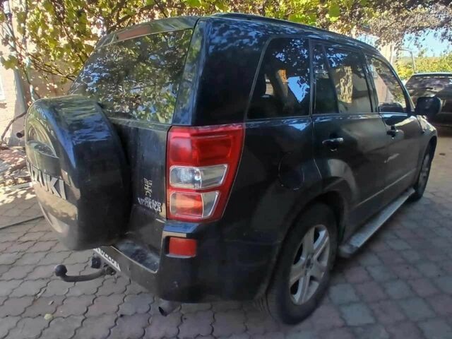 Черный Сузуки Гранд Витара, объемом двигателя 2 л и пробегом 210 тыс. км за 5800 $, фото 2 на Automoto.ua