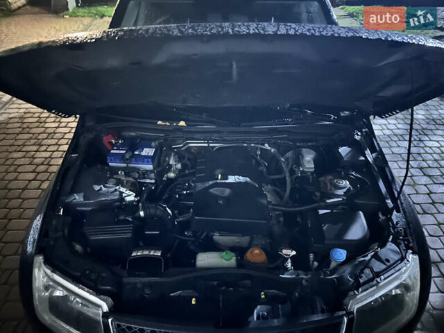 Черный Сузуки Гранд Витара, объемом двигателя 2 л и пробегом 190 тыс. км за 9000 $, фото 2 на Automoto.ua