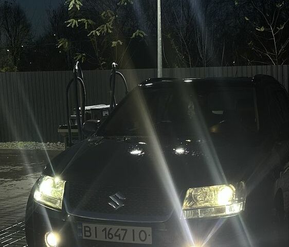 Чорний Сузукі Гранд Вітара, об'ємом двигуна 2 л та пробігом 300 тис. км за 6599 $, фото 7 на Automoto.ua