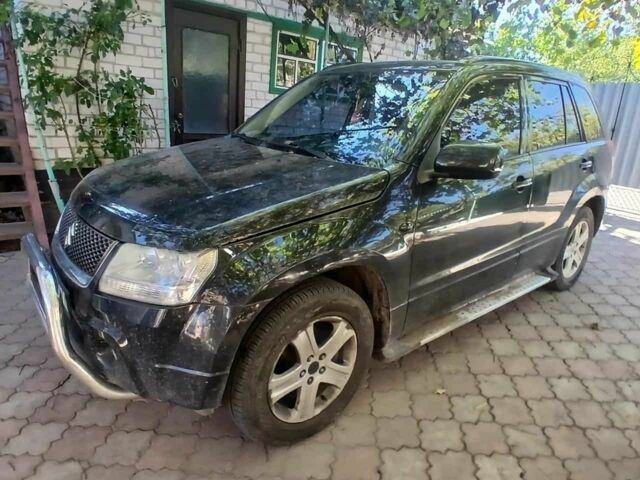 Черный Сузуки Гранд Витара, объемом двигателя 2 л и пробегом 210 тыс. км за 5800 $, фото 1 на Automoto.ua