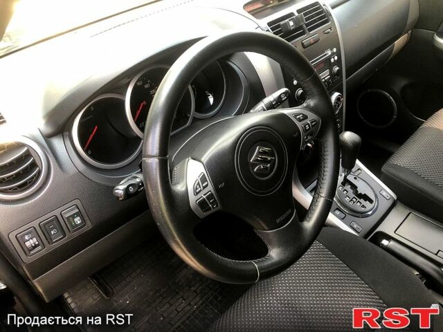 Черный Сузуки Гранд Витара, объемом двигателя 2 л и пробегом 265 тыс. км за 8500 $, фото 1 на Automoto.ua