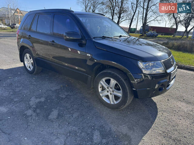 Черный Сузуки Гранд Витара, объемом двигателя 2 л и пробегом 230 тыс. км за 6800 $, фото 1 на Automoto.ua