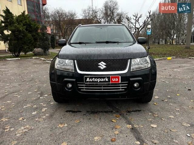 Черный Сузуки Гранд Витара, объемом двигателя 2 л и пробегом 238 тыс. км за 8790 $, фото 1 на Automoto.ua