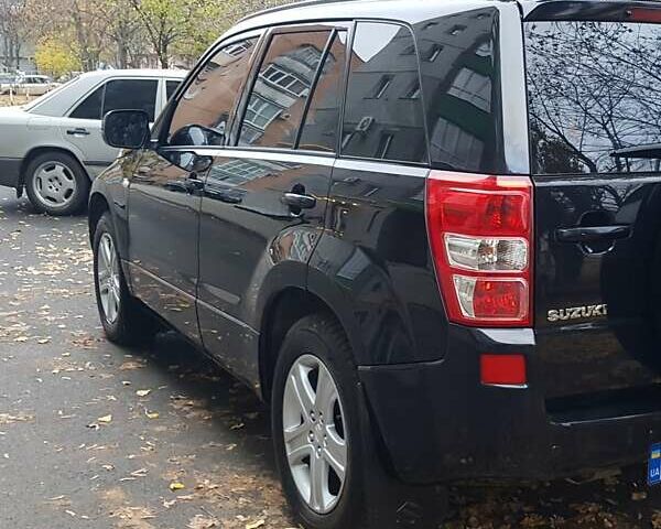 Черный Сузуки Гранд Витара, объемом двигателя 2 л и пробегом 235 тыс. км за 7300 $, фото 1 на Automoto.ua