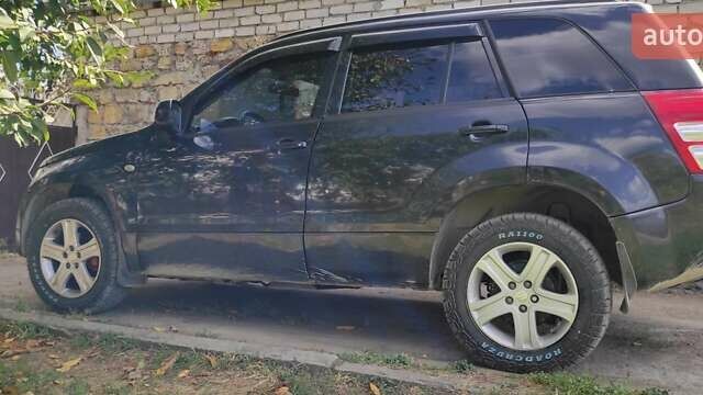 Черный Сузуки Гранд Витара, объемом двигателя 2 л и пробегом 345 тыс. км за 7000 $, фото 3 на Automoto.ua