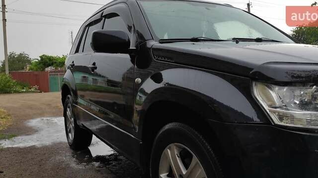 Черный Сузуки Гранд Витара, объемом двигателя 2 л и пробегом 345 тыс. км за 7000 $, фото 2 на Automoto.ua