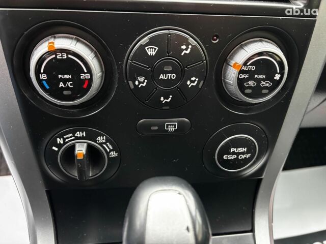 Чорний Сузукі Гранд Вітара, об'ємом двигуна 2 л та пробігом 238 тис. км за 8790 $, фото 20 на Automoto.ua