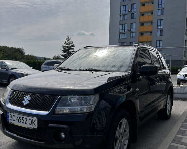 Черный Сузуки Гранд Витара, объемом двигателя 2 л и пробегом 211 тыс. км за 7499 $, фото 1 на Automoto.ua