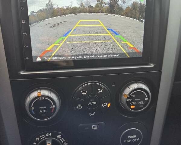 Чорний Сузукі Гранд Вітара, об'ємом двигуна 2 л та пробігом 237 тис. км за 8500 $, фото 19 на Automoto.ua