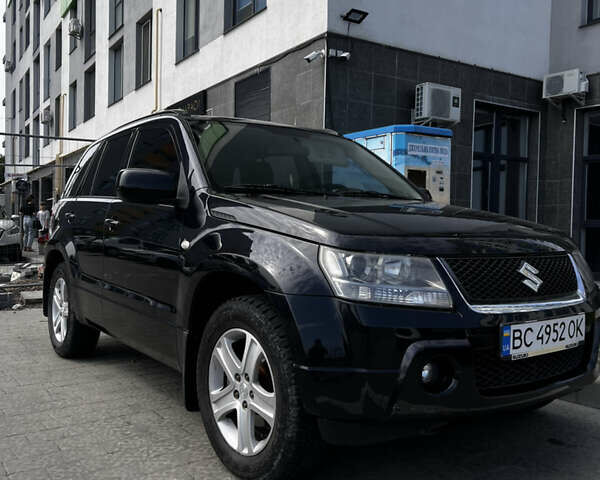 Черный Сузуки Гранд Витара, объемом двигателя 2 л и пробегом 211 тыс. км за 7499 $, фото 2 на Automoto.ua