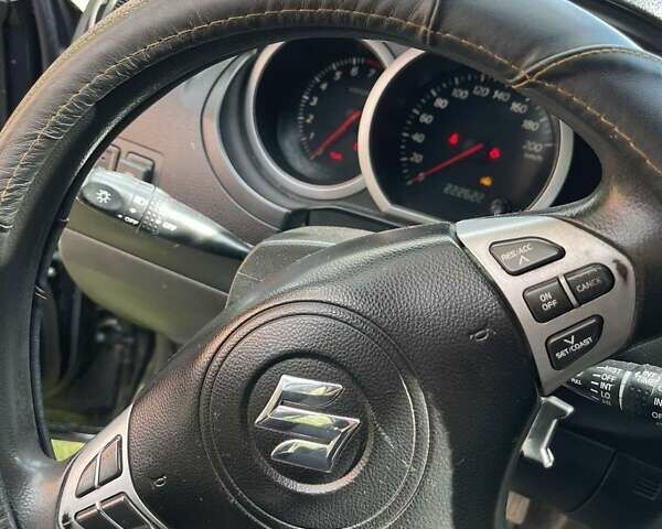 Чорний Сузукі Гранд Вітара, об'ємом двигуна 2 л та пробігом 222 тис. км за 7699 $, фото 1 на Automoto.ua