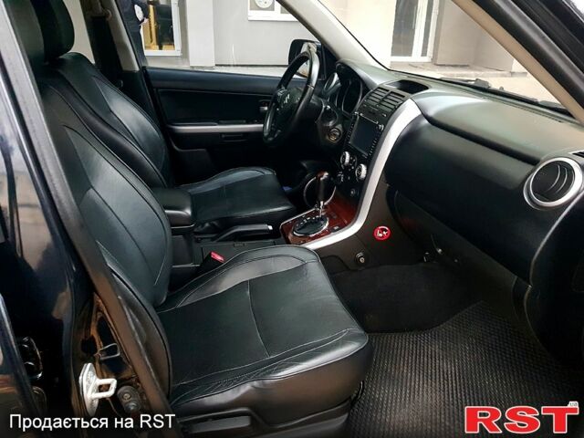 Черный Сузуки Гранд Витара, объемом двигателя 2 л и пробегом 235 тыс. км за 7500 $, фото 4 на Automoto.ua