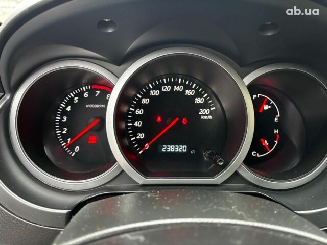 Чорний Сузукі Гранд Вітара, об'ємом двигуна 2 л та пробігом 238 тис. км за 8790 $, фото 22 на Automoto.ua