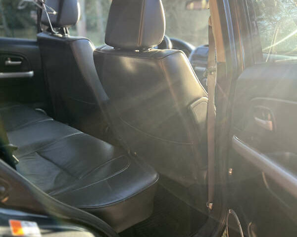 Чорний Сузукі Гранд Вітара, об'ємом двигуна 2 л та пробігом 209 тис. км за 7500 $, фото 25 на Automoto.ua