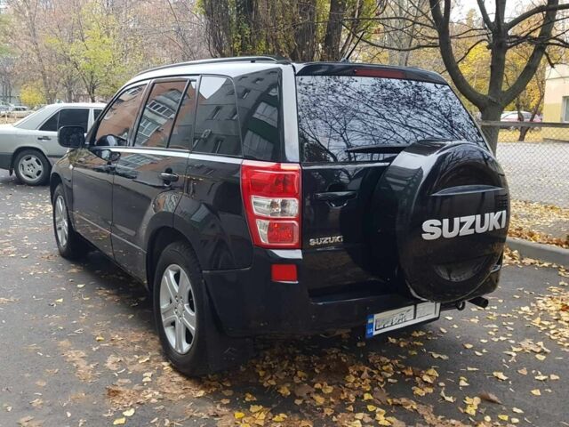 Черный Сузуки Гранд Витара, объемом двигателя 2 л и пробегом 235 тыс. км за 7500 $, фото 1 на Automoto.ua