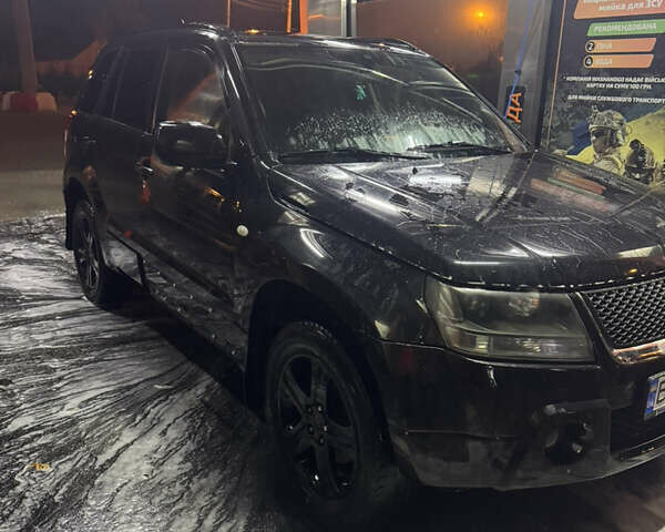 Черный Сузуки Гранд Витара, объемом двигателя 2 л и пробегом 177 тыс. км за 6600 $, фото 1 на Automoto.ua