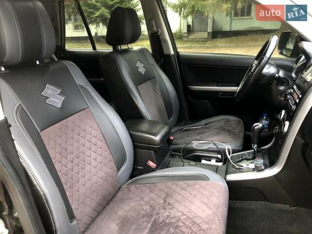 Чорний Сузукі Гранд Вітара, об'ємом двигуна 2 л та пробігом 180 тис. км за 6800 $, фото 13 на Automoto.ua