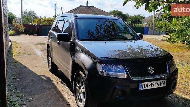 Черный Сузуки Гранд Витара, объемом двигателя 2 л и пробегом 345 тыс. км за 7000 $, фото 1 на Automoto.ua