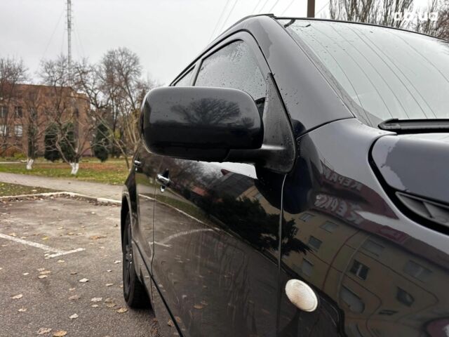 Чорний Сузукі Гранд Вітара, об'ємом двигуна 2 л та пробігом 238 тис. км за 8790 $, фото 9 на Automoto.ua