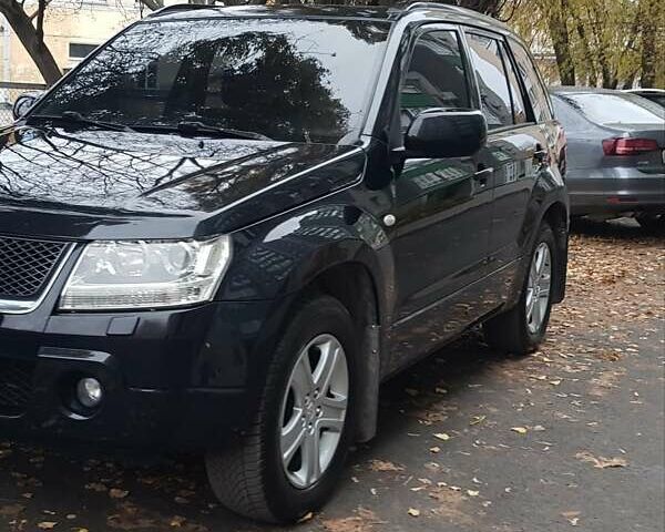 Черный Сузуки Гранд Витара, объемом двигателя 2 л и пробегом 235 тыс. км за 7300 $, фото 2 на Automoto.ua