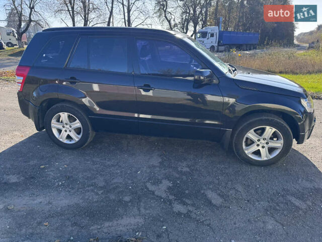 Черный Сузуки Гранд Витара, объемом двигателя 2 л и пробегом 230 тыс. км за 6800 $, фото 2 на Automoto.ua
