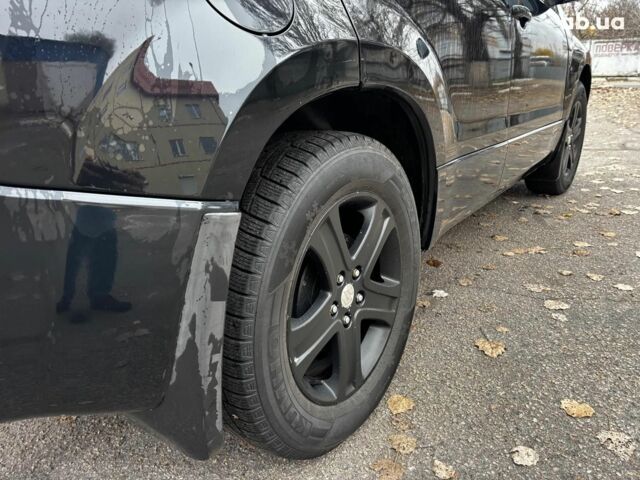 Чорний Сузукі Гранд Вітара, об'ємом двигуна 2 л та пробігом 238 тис. км за 8790 $, фото 10 на Automoto.ua