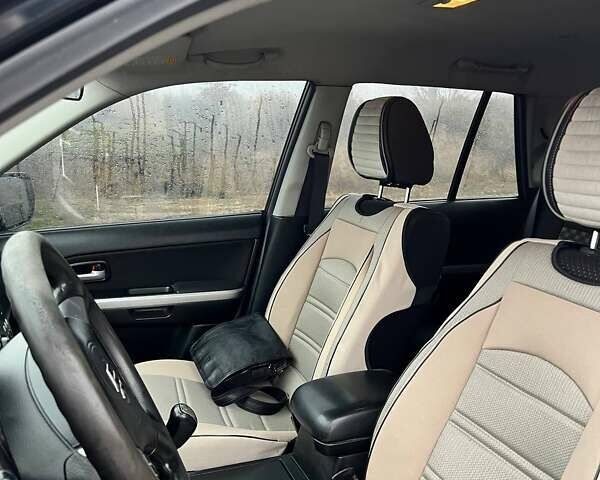 Черный Сузуки Гранд Витара, объемом двигателя 2.39 л и пробегом 289 тыс. км за 9500 $, фото 12 на Automoto.ua