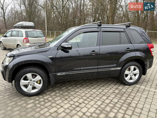 Чорний Сузукі Гранд Вітара, об'ємом двигуна 2.39 л та пробігом 240 тис. км за 8999 $, фото 1 на Automoto.ua