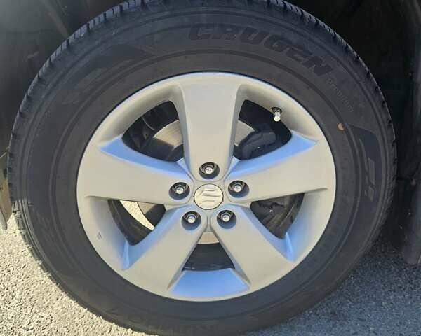 Черный Сузуки Гранд Витара, объемом двигателя 2.4 л и пробегом 175 тыс. км за 11500 $, фото 5 на Automoto.ua