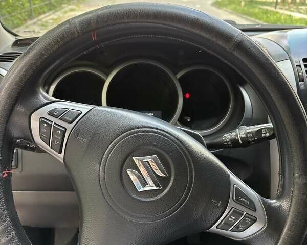 Чорний Сузукі Гранд Вітара, об'ємом двигуна 2.39 л та пробігом 283 тис. км за 7900 $, фото 2 на Automoto.ua