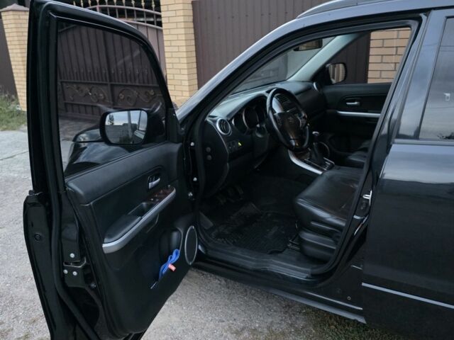 Чорний Сузукі Гранд Вітара, об'ємом двигуна 2 л та пробігом 150 тис. км за 10500 $, фото 6 на Automoto.ua