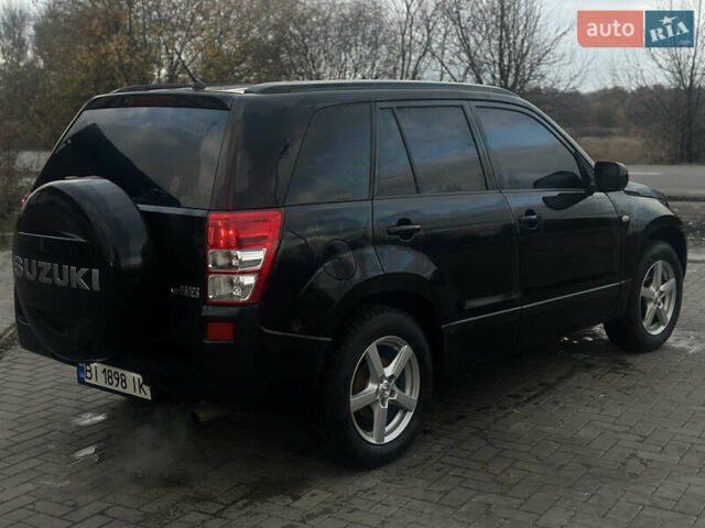 Черный Сузуки Гранд Витара, объемом двигателя 2 л и пробегом 235 тыс. км за 10500 $, фото 5 на Automoto.ua