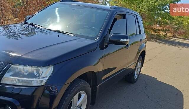 Чорний Сузукі Гранд Вітара, об'ємом двигуна 2.39 л та пробігом 102 тис. км за 8100 $, фото 1 на Automoto.ua
