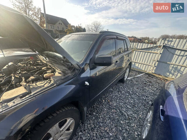 Черный Сузуки Гранд Витара, объемом двигателя 2 л и пробегом 240 тыс. км за 2900 $, фото 1 на Automoto.ua