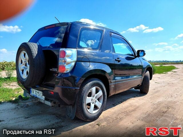 Черный Сузуки Гранд Витара, объемом двигателя 2.4 л и пробегом 119 тыс. км за 8200 $, фото 3 на Automoto.ua