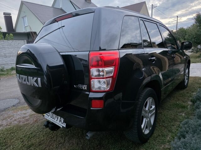 Чорний Сузукі Гранд Вітара, об'ємом двигуна 2 л та пробігом 150 тис. км за 10500 $, фото 11 на Automoto.ua