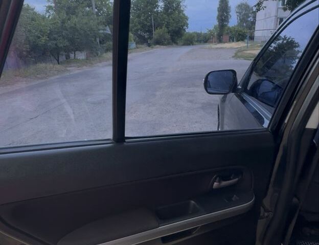 Чорний Сузукі Гранд Вітара, об'ємом двигуна 2.4 л та пробігом 125 тис. км за 8500 $, фото 9 на Automoto.ua