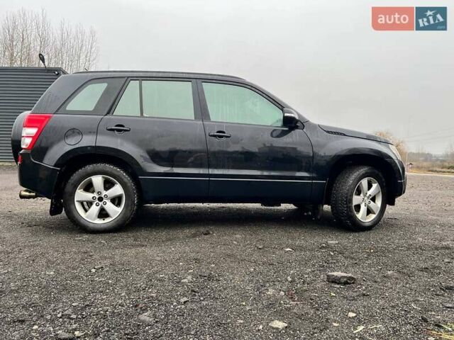 Черный Сузуки Гранд Витара, объемом двигателя 2.39 л и пробегом 289 тыс. км за 9500 $, фото 3 на Automoto.ua