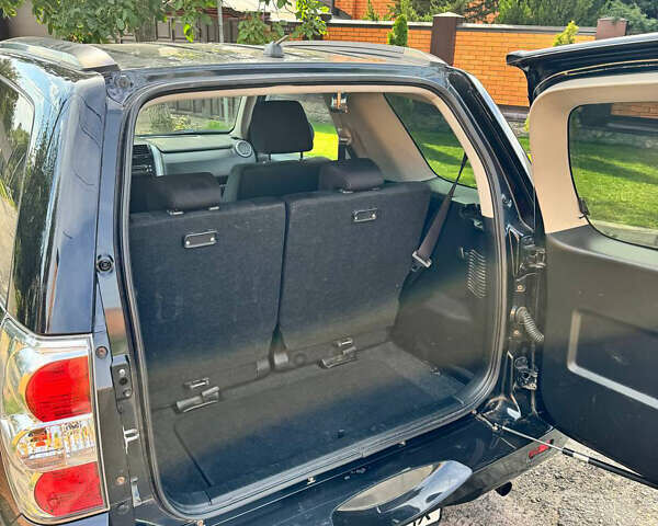 Чорний Сузукі Гранд Вітара, об'ємом двигуна 2.4 л та пробігом 170 тис. км за 8800 $, фото 11 на Automoto.ua