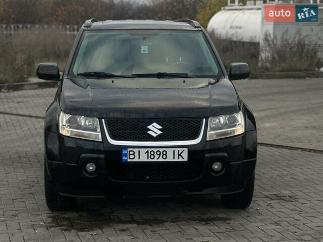 Черный Сузуки Гранд Витара, объемом двигателя 2 л и пробегом 235 тыс. км за 10500 $, фото 1 на Automoto.ua