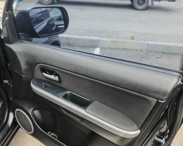 Чорний Сузукі Гранд Вітара, об'ємом двигуна 2.4 л та пробігом 328 тис. км за 9900 $, фото 3 на Automoto.ua