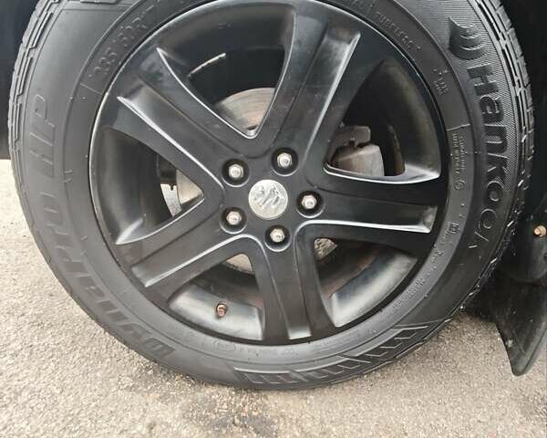 Чорний Сузукі Гранд Вітара, об'ємом двигуна 2.4 л та пробігом 328 тис. км за 9900 $, фото 23 на Automoto.ua