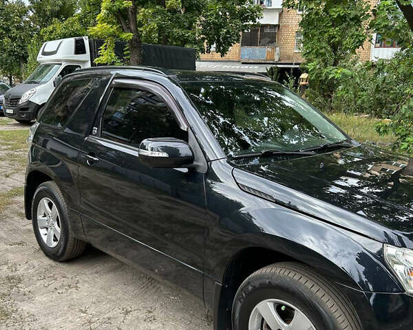 Черный Сузуки Гранд Витара, объемом двигателя 2.4 л и пробегом 101 тыс. км за 8900 $, фото 1 на Automoto.ua